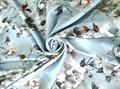 Плательная ткань Итальянка  принт цветы на нежно голубом состав 100% ПЭ - фото 9222